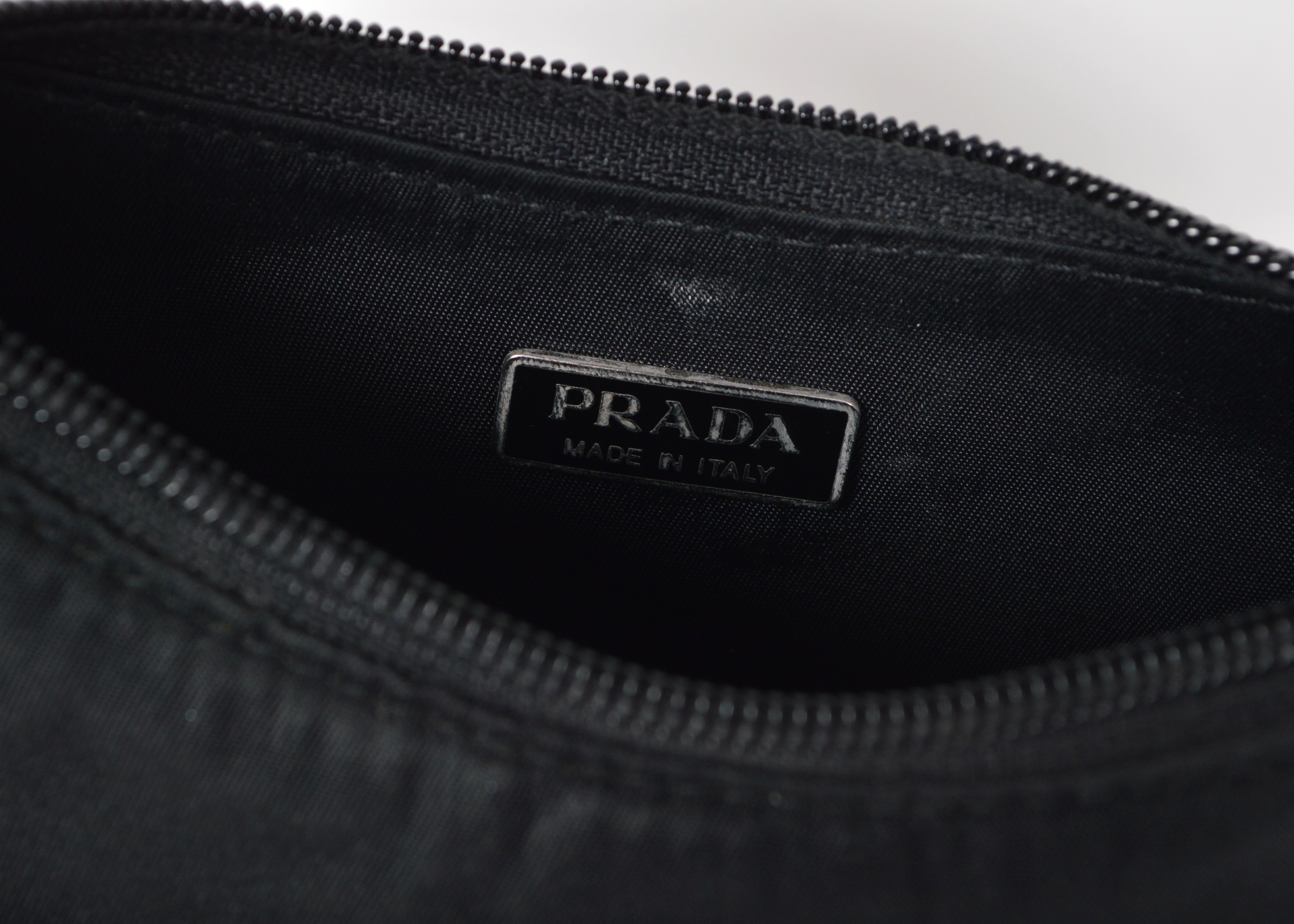 A Set of Two Black Designer Handbags