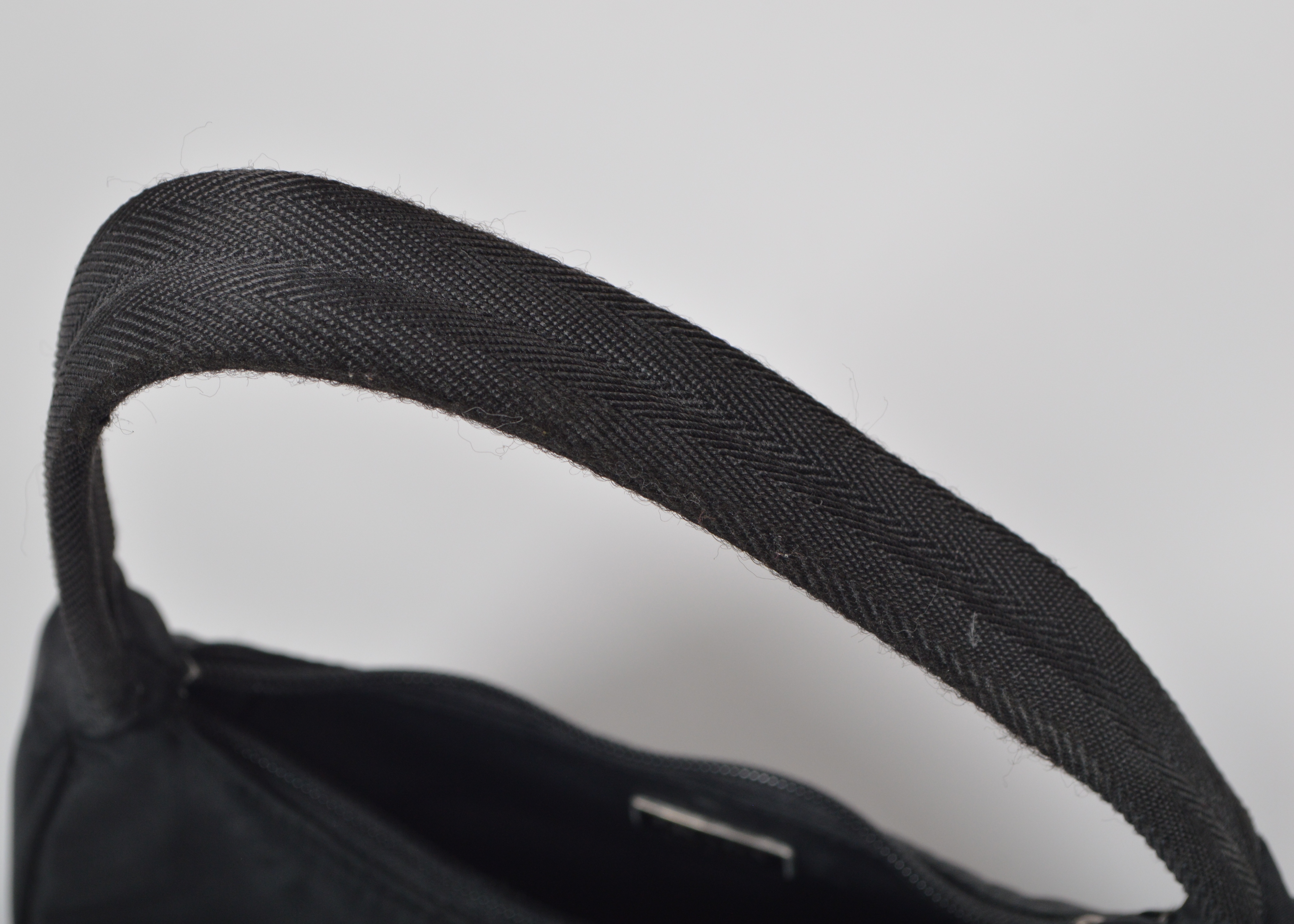 A Set of Two Black Designer Handbags