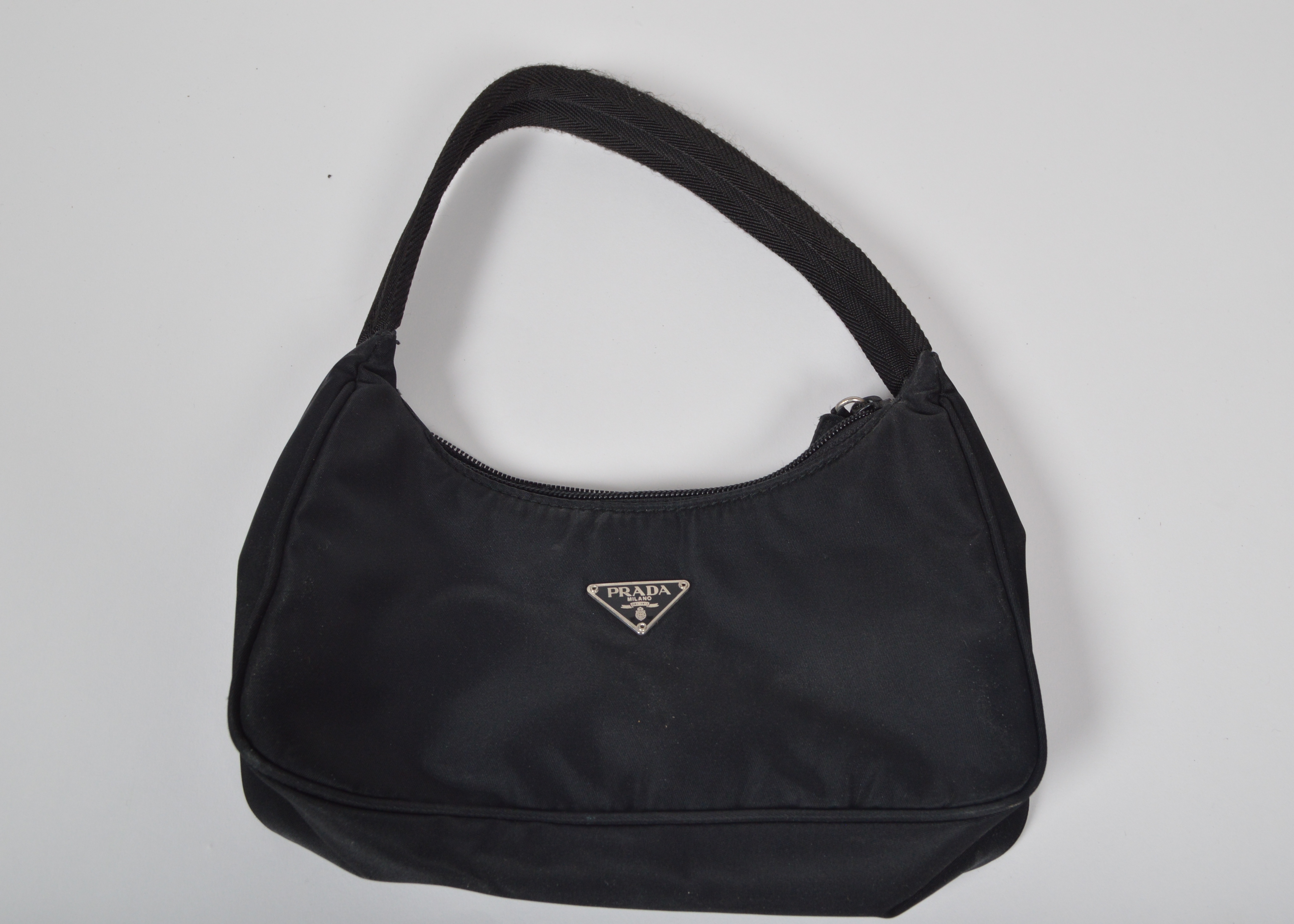 A Set of Two Black Designer Handbags