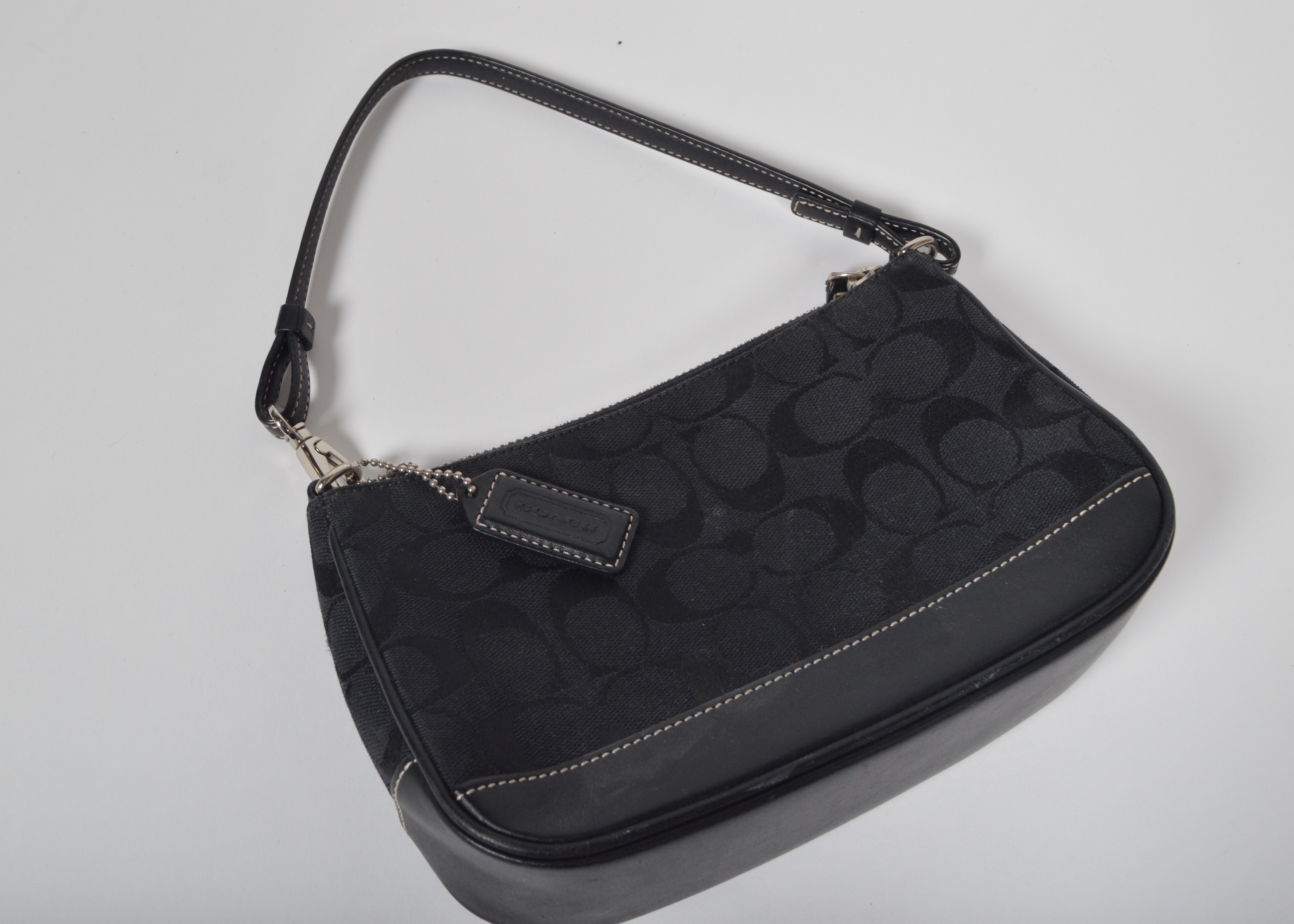 A Set of Two Black Designer Handbags