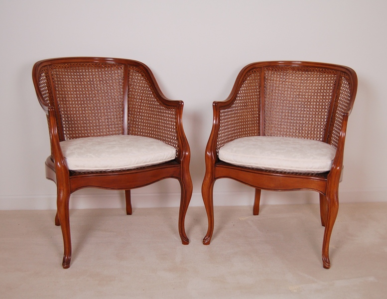 Pair of Caned Armchairs with Creme Cushion
