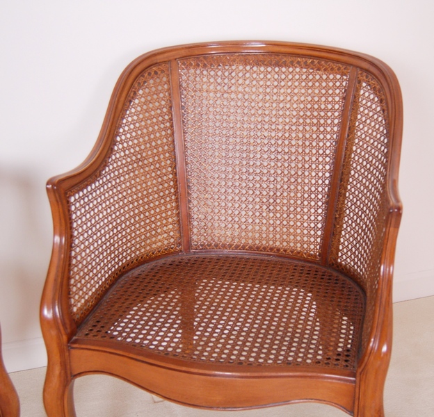 Pair of Caned Armchairs with Creme Cushion