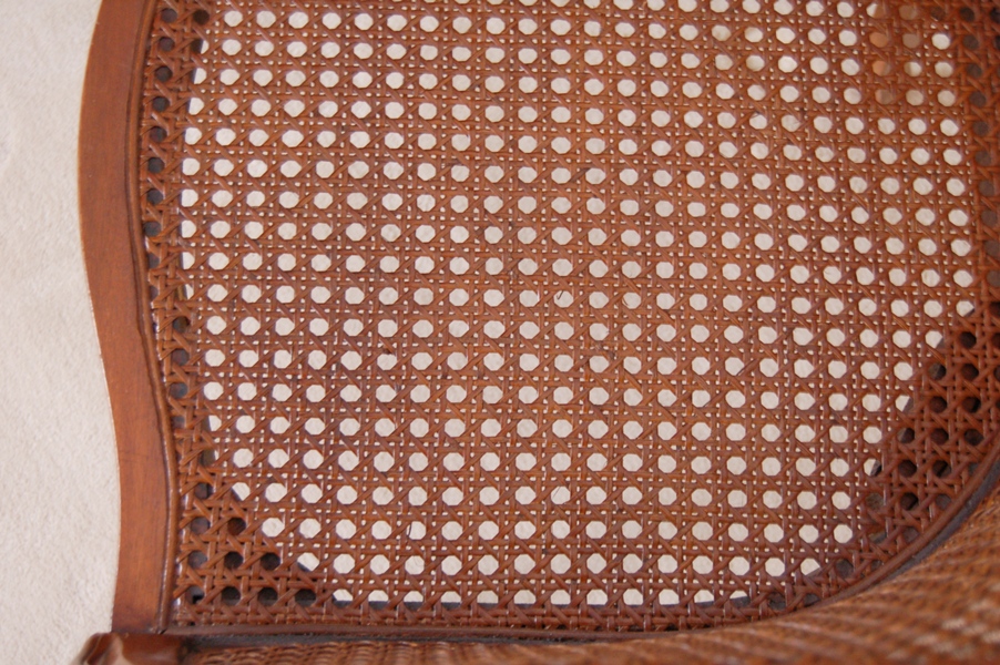 Pair of Caned Armchairs with Creme Cushion