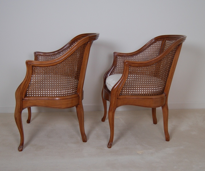 Pair of Caned Armchairs with Creme Cushion