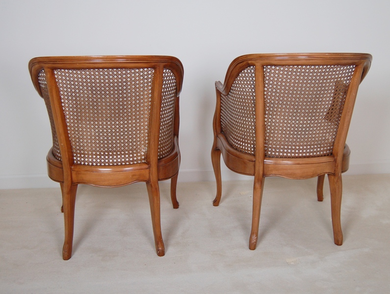 Pair of Caned Armchairs with Creme Cushion