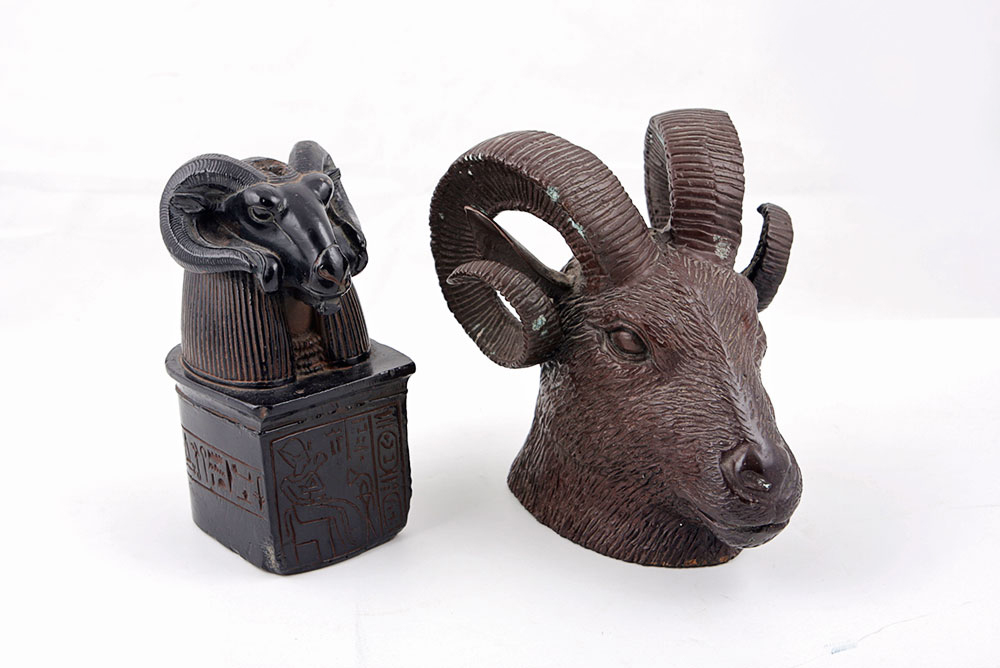 Pair of Ram Head Figurines