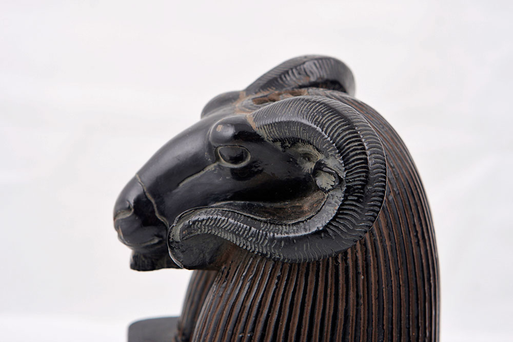 Pair of Ram Head Figurines