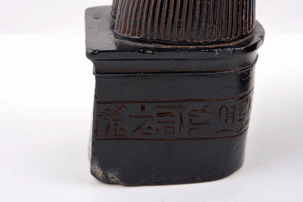 Pair of Ram Head Figurines