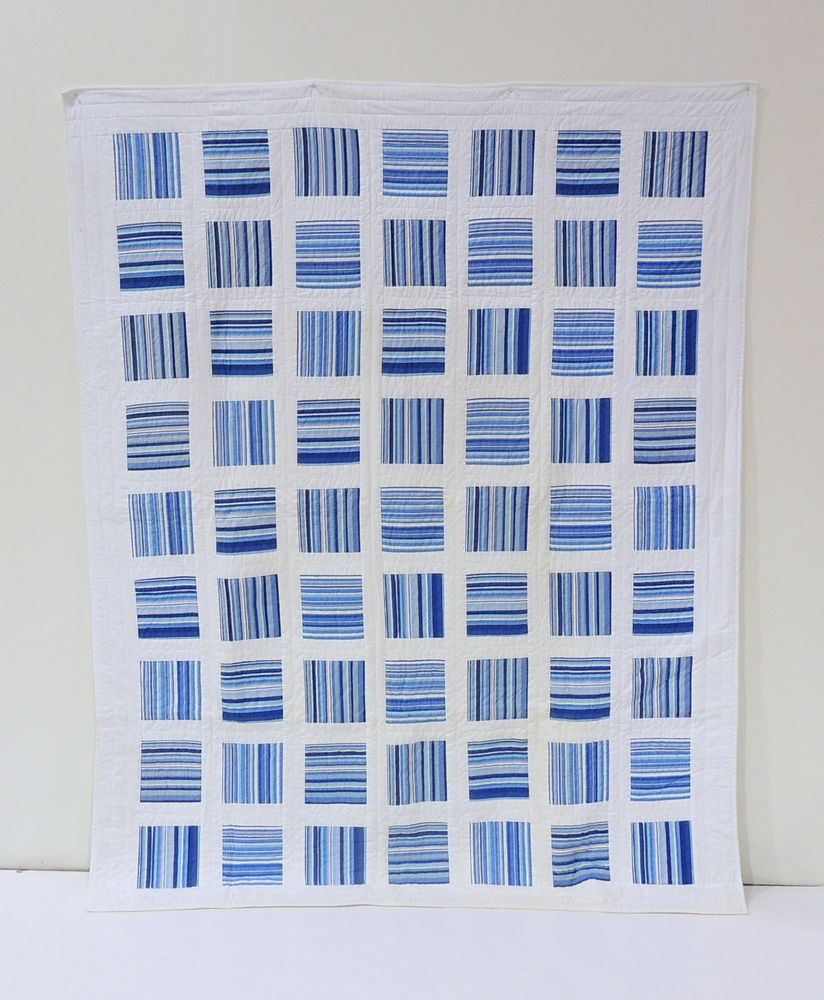 Blue and White Quilted Blanket