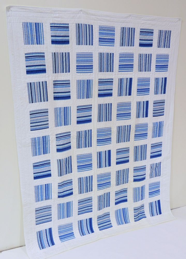 Blue and White Quilted Blanket