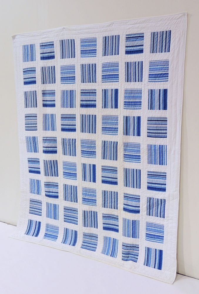 Blue and White Quilted Blanket