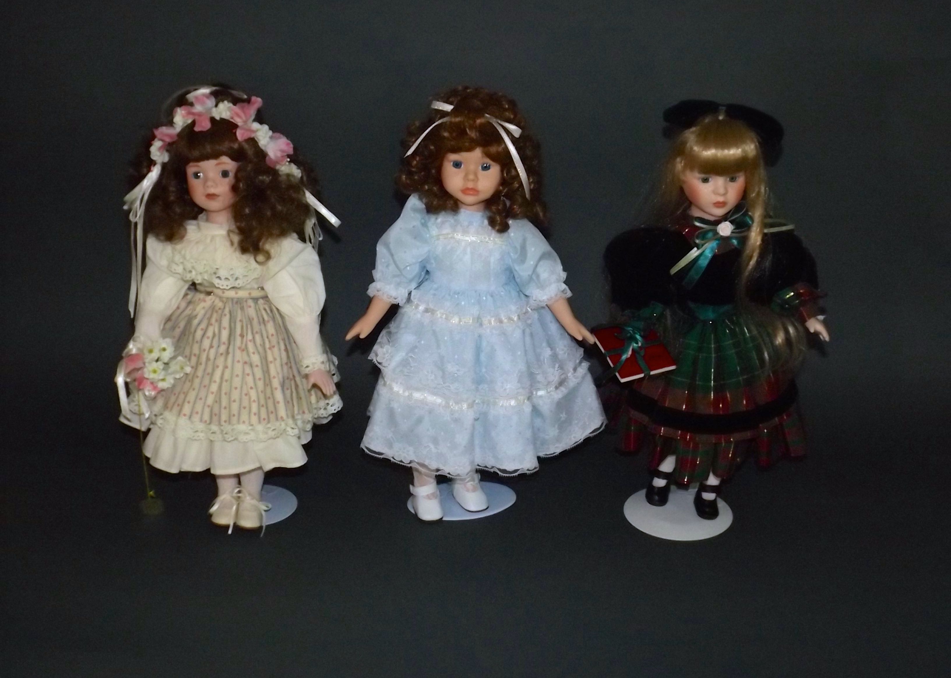 Porcelain Dolls in Victorian and Modern Attire