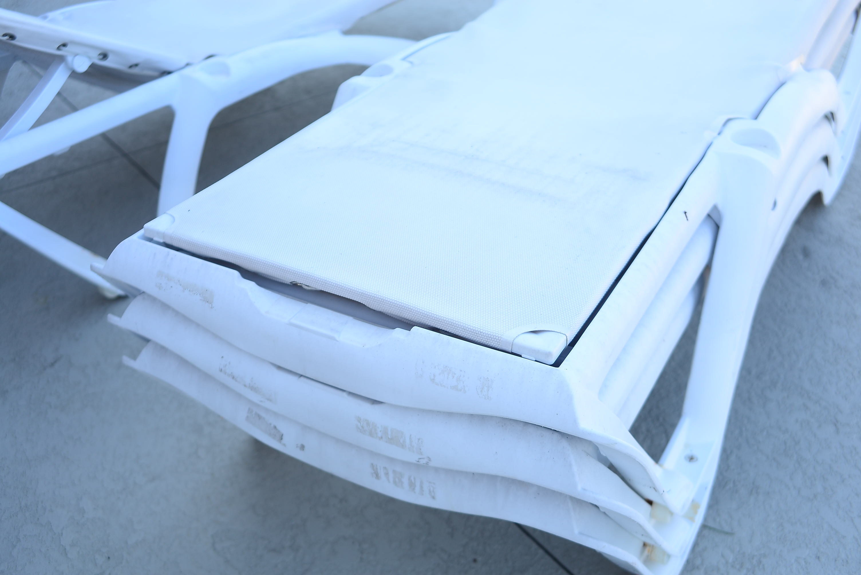 Four Frontgate Pool Loungers