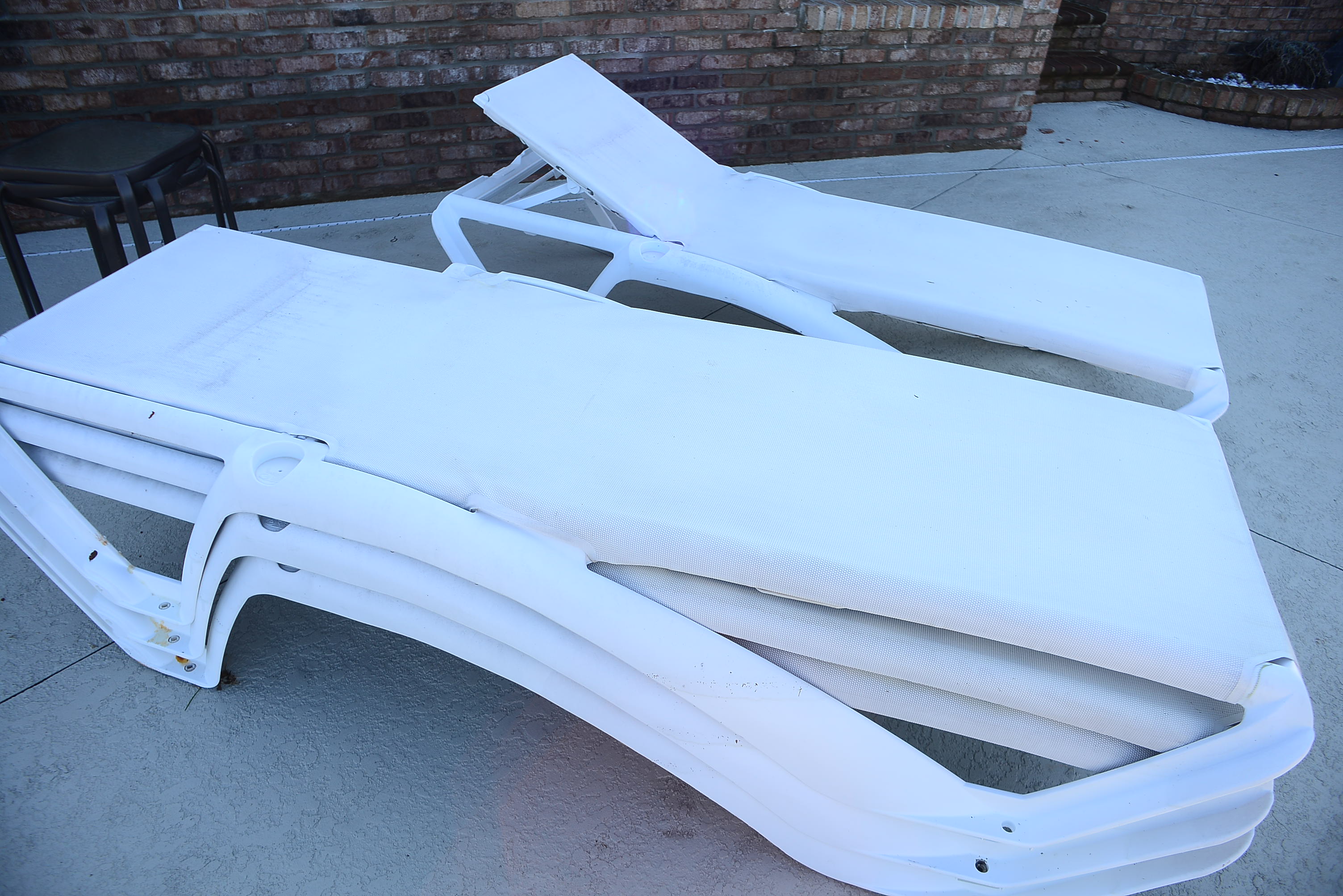 Four Frontgate Pool Loungers