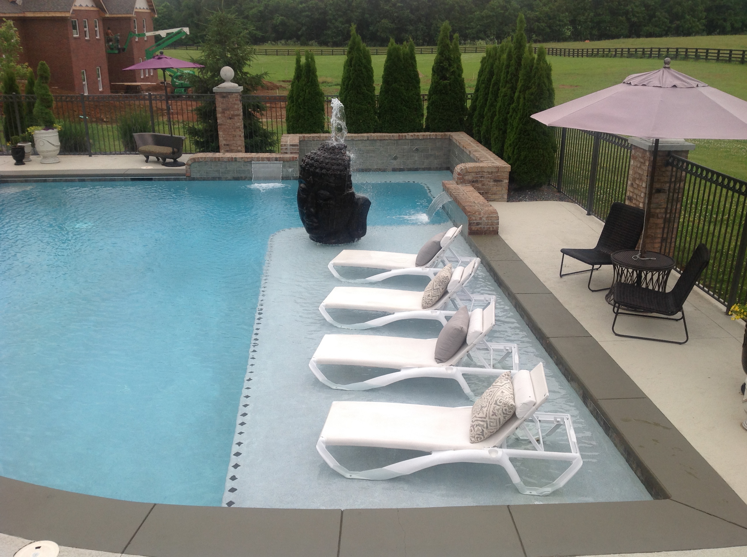 Four Frontgate Pool Loungers