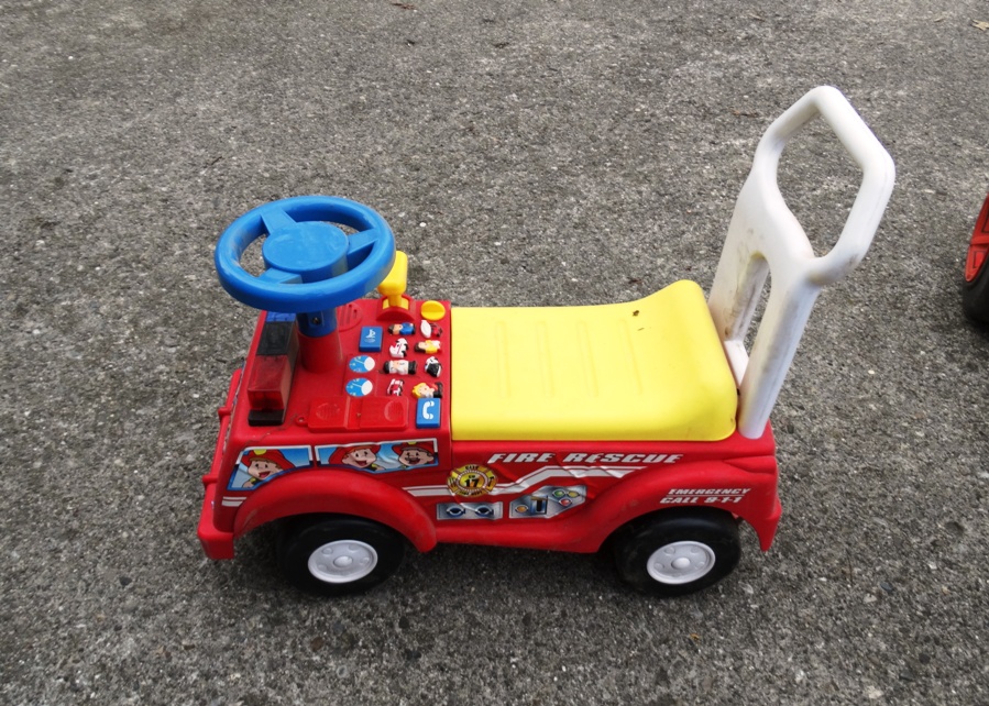Group of Vintage Scooters and Other Wheeled Toys