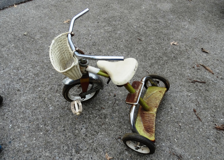 Group of Vintage Scooters and Other Wheeled Toys