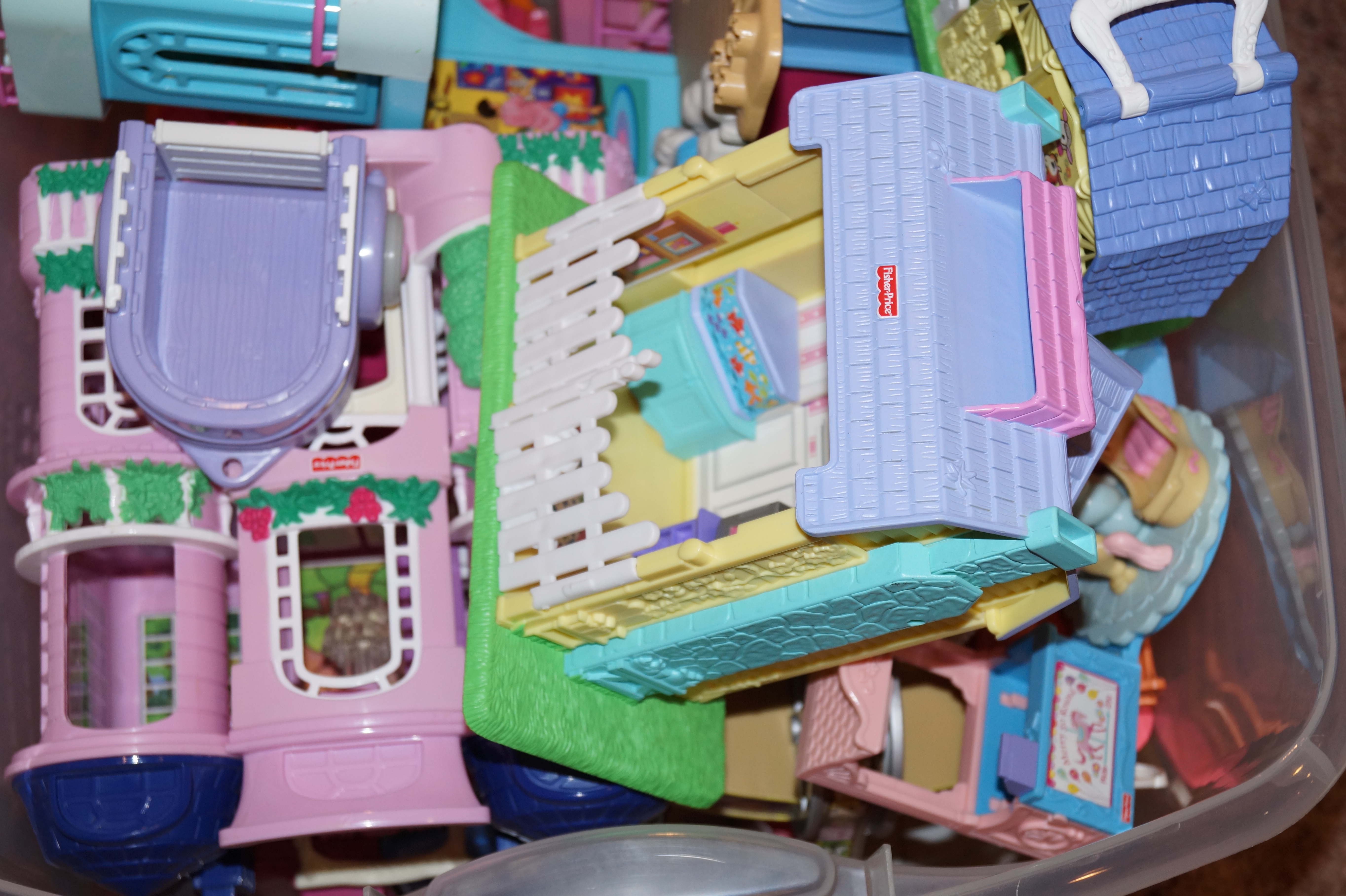 Two Bins Full of Fisher Price/Mattel Toys