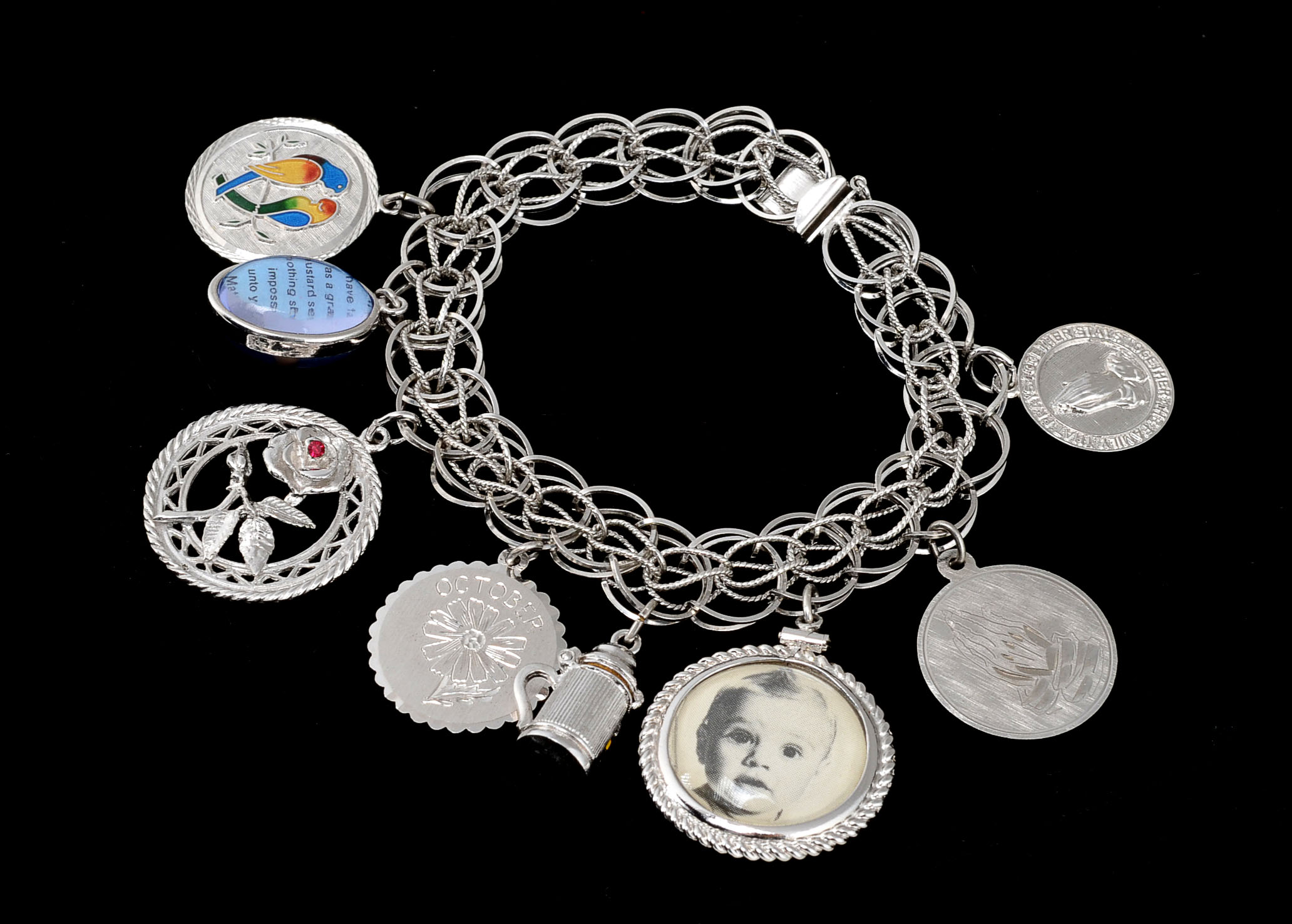 Sterling and Silver Tone Metal Charm Bracelet