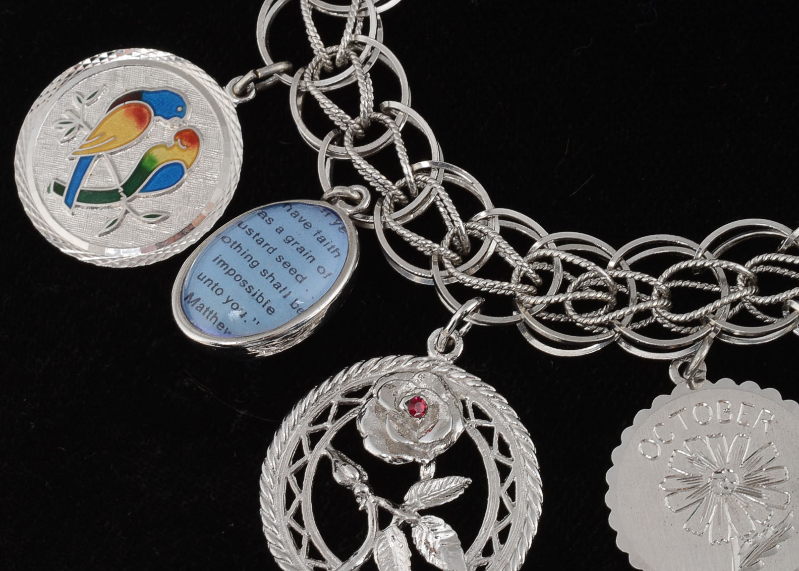 Sterling and Silver Tone Metal Charm Bracelet