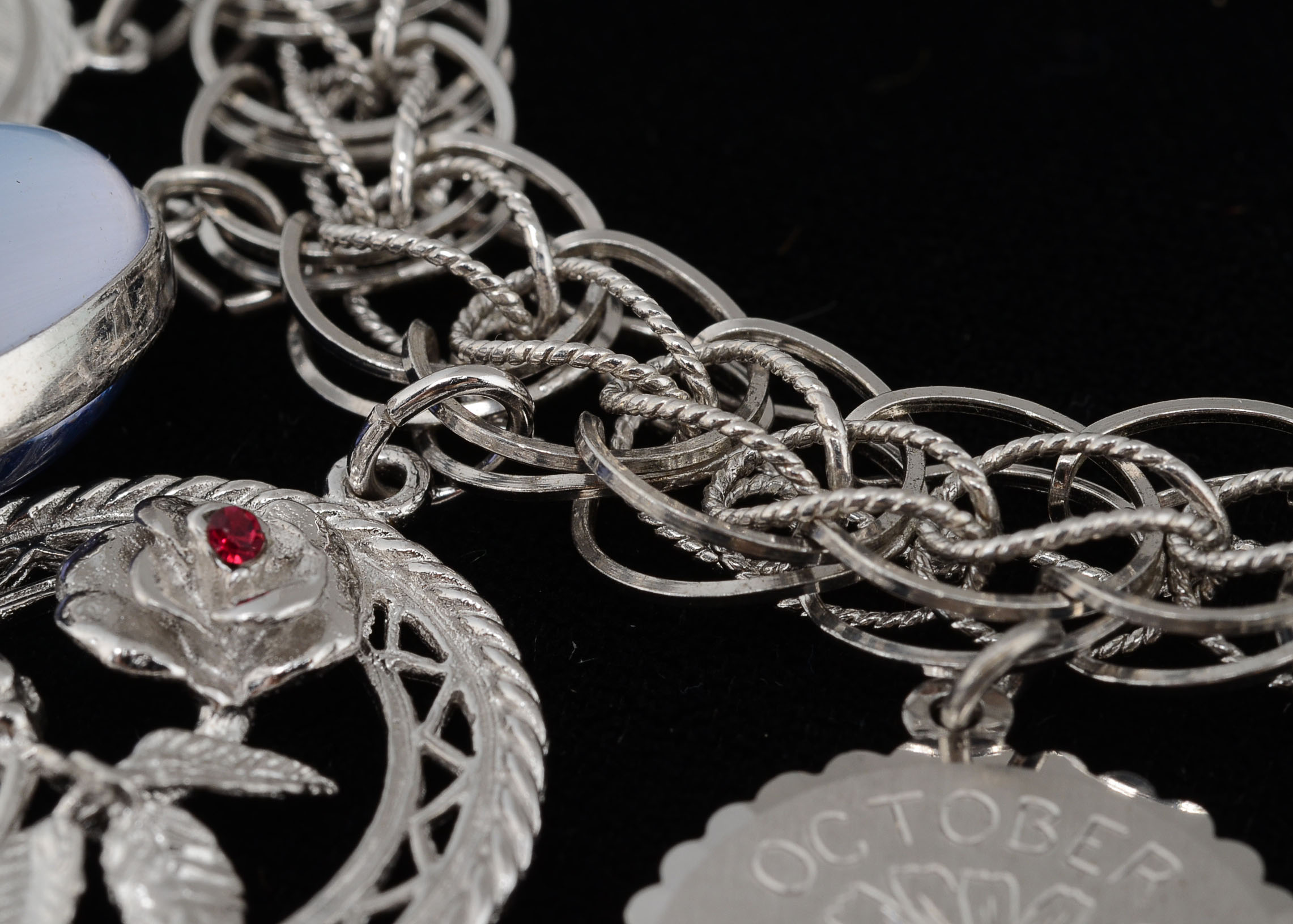 Sterling and Silver Tone Metal Charm Bracelet