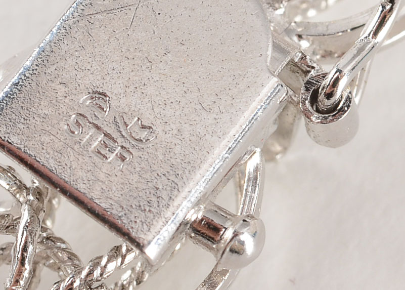 Sterling and Silver Tone Metal Charm Bracelet