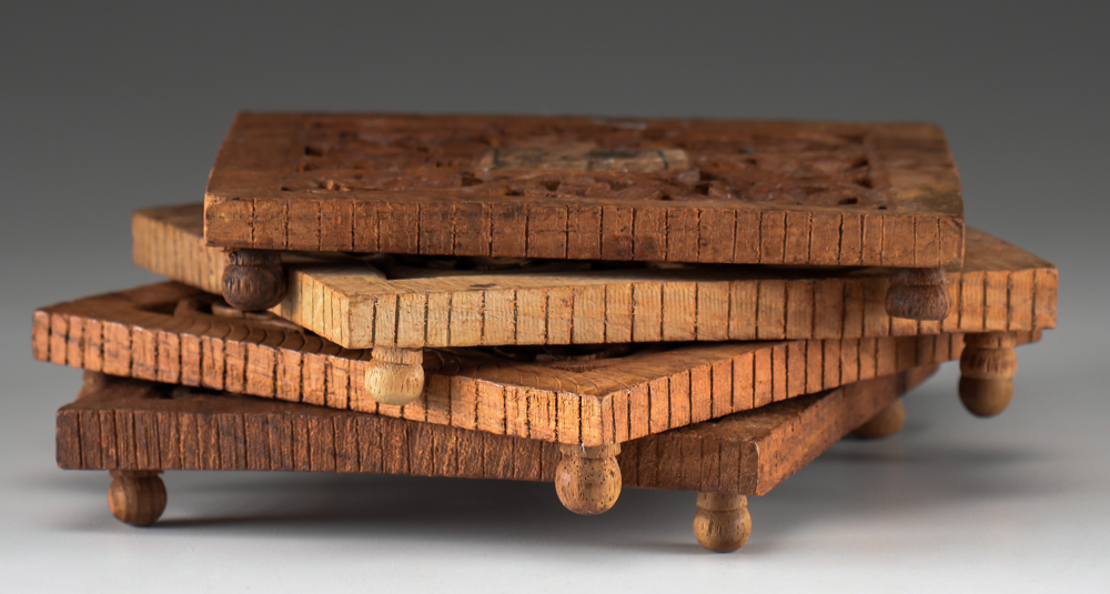 Four Hand-Carved Vintage Wooden Trivets