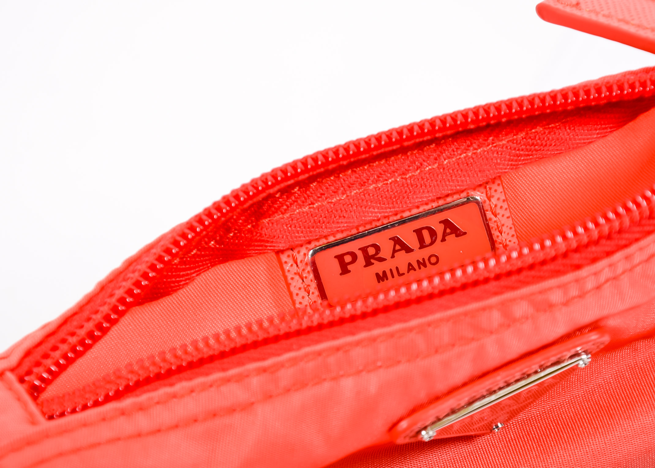 Coral Prada Clutch