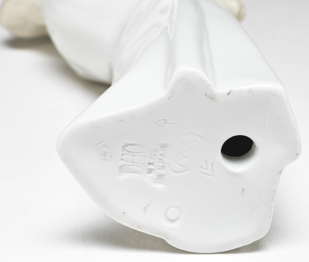 Vintage NAO Lladro "Boy Blowing" a Kiss