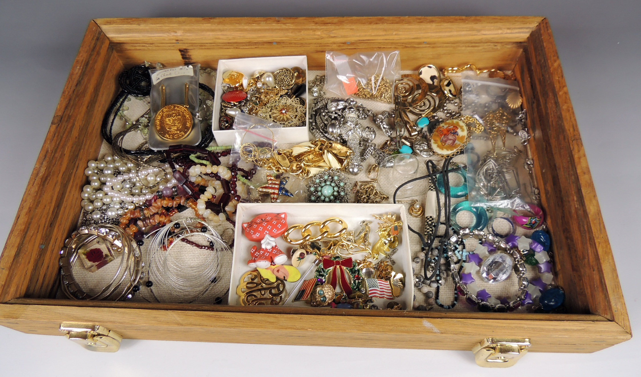 Large Assortment of Costume Jewelry with Display Case