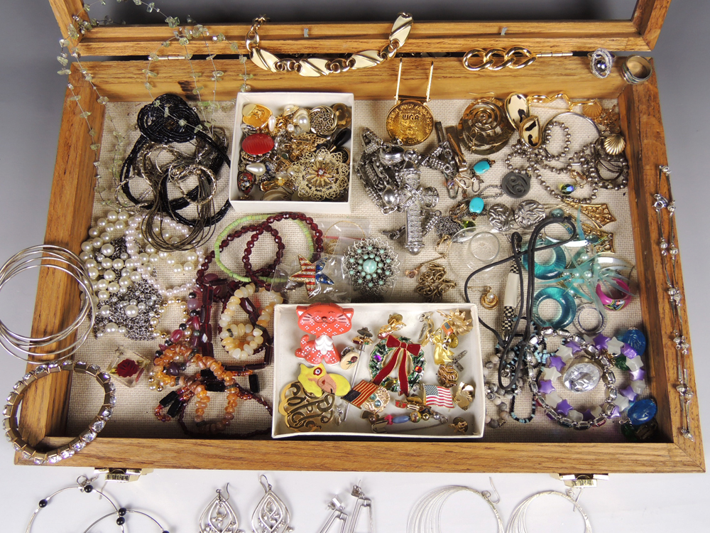 Large Assortment of Costume Jewelry with Display Case