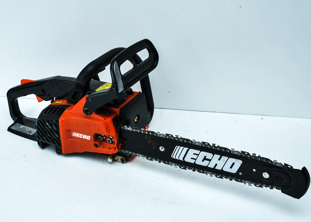 ECHO CS 306 Chainsaw and an Extension Pole Branch Trimmer