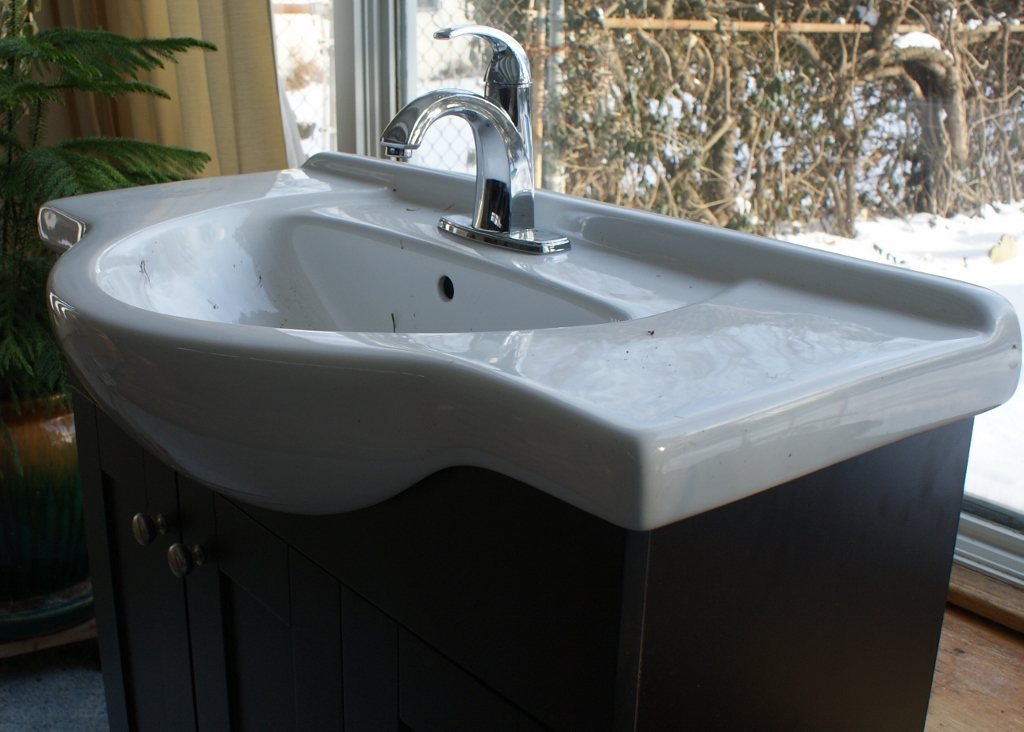 Pfister Unused Sink and Faucet with Vanity