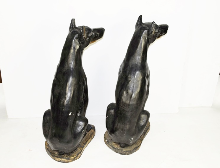 Pair of Life Size Painted Plaster Doberman Pincer Dogs