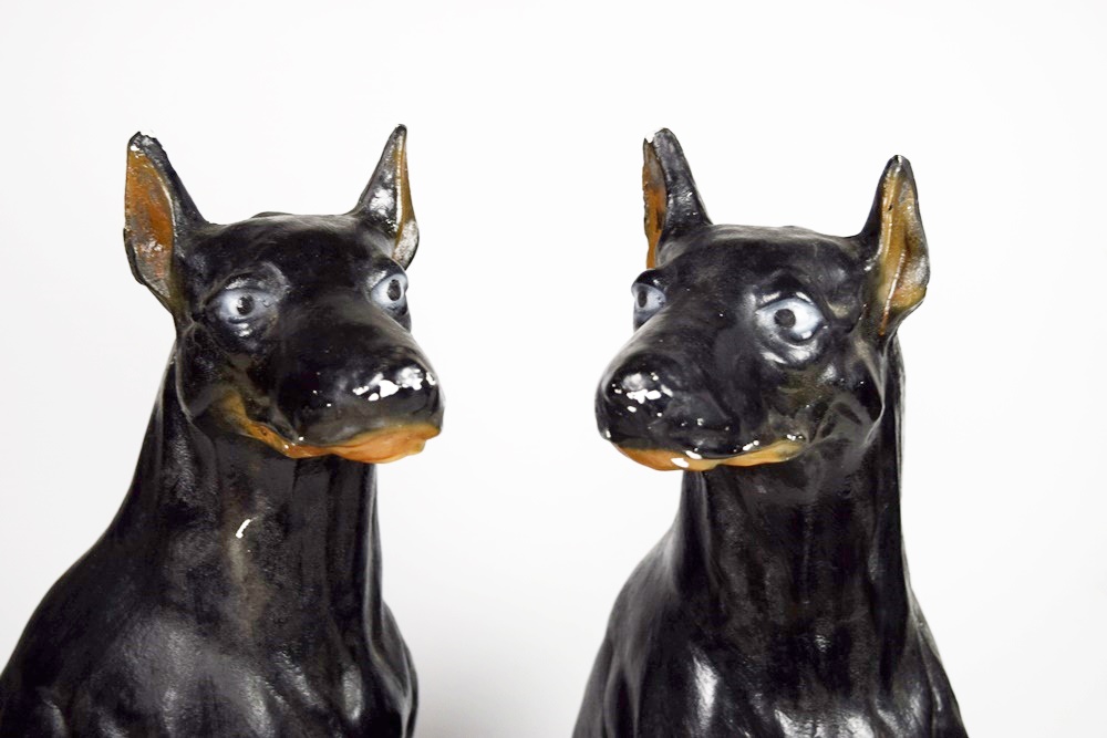 Pair of Life Size Painted Plaster Doberman Pincer Dogs