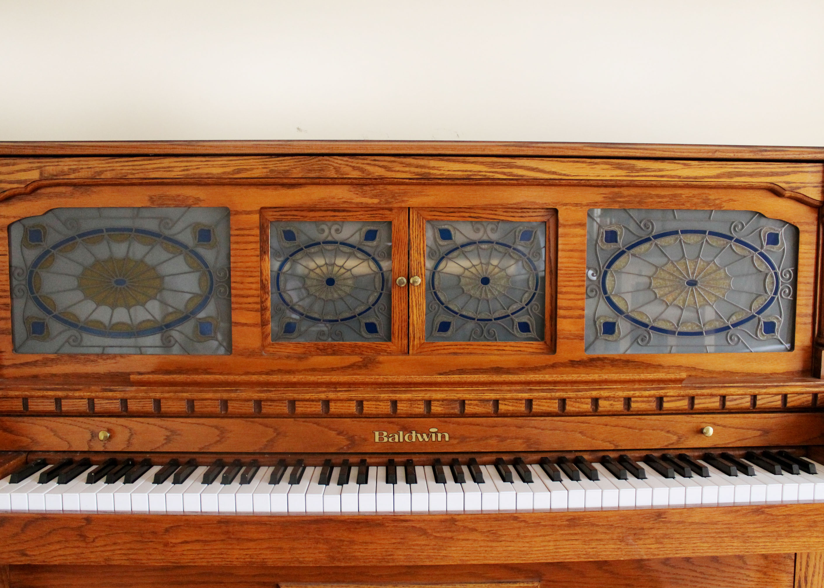 Oak Baldwin Player Piano and Bench with 50 Piano Rolls