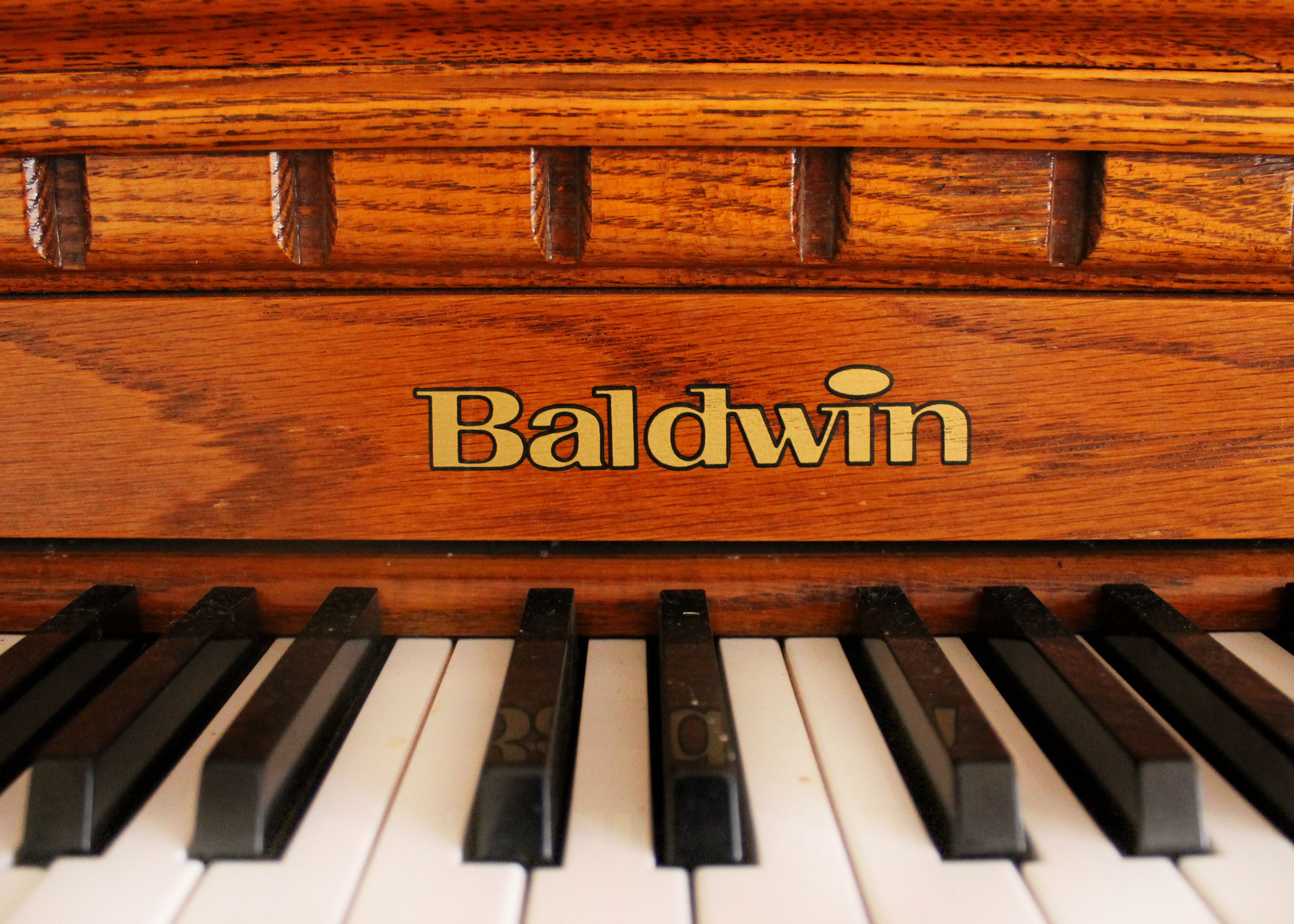 Oak Baldwin Player Piano and Bench with 50 Piano Rolls