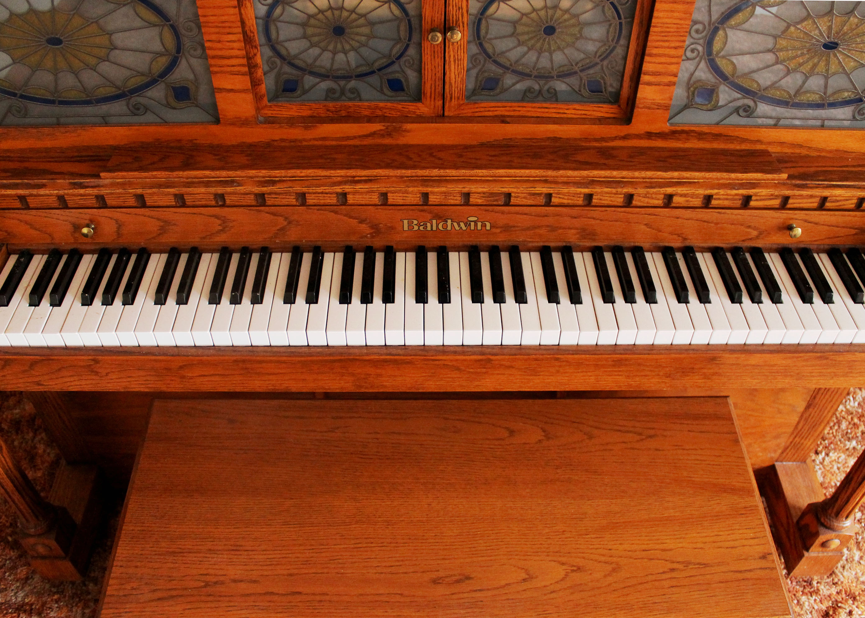 Oak Baldwin Player Piano and Bench with 50 Piano Rolls