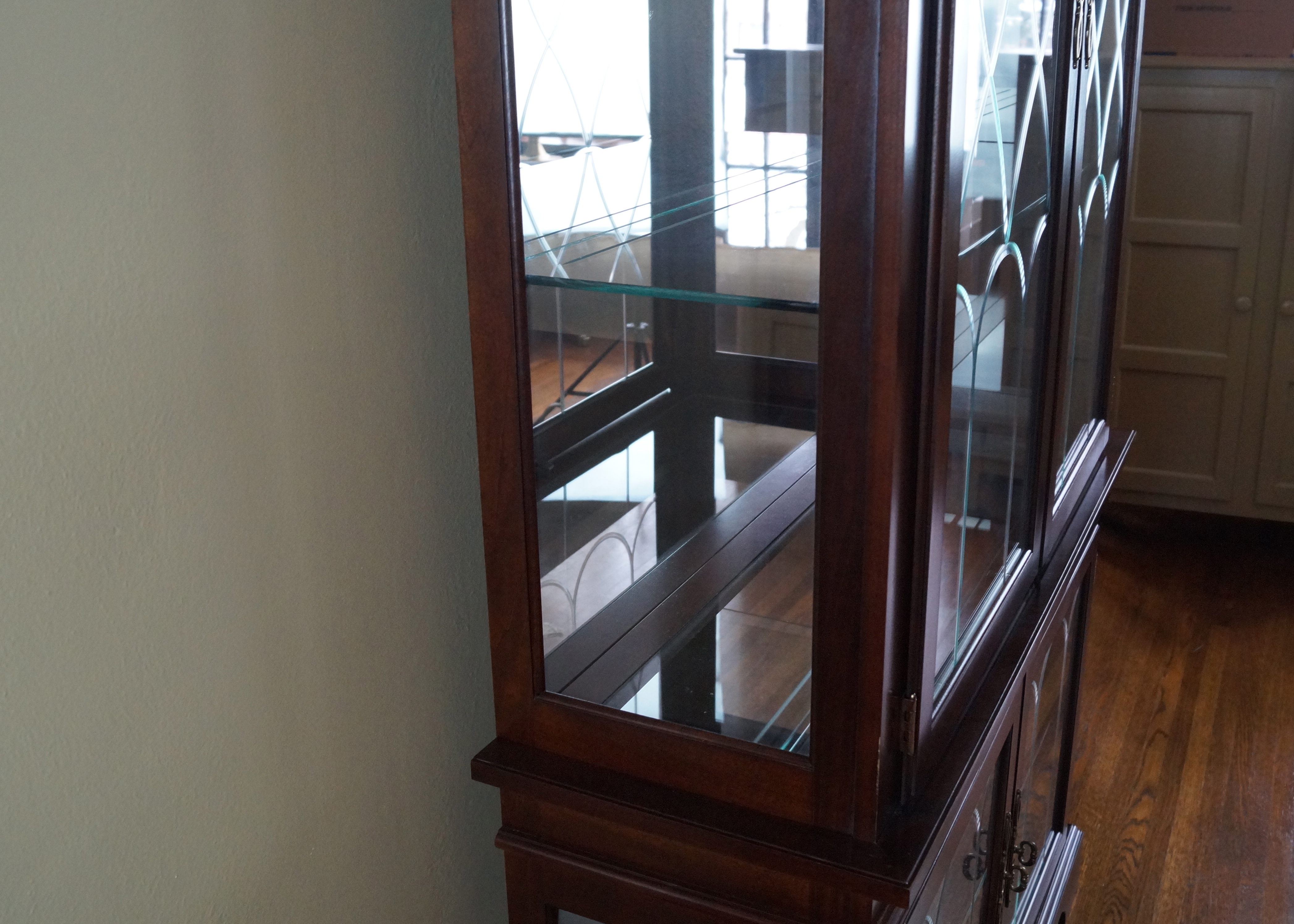 Philip Reinisch Cherry Finish Curio Cabinet with Beveled Glass