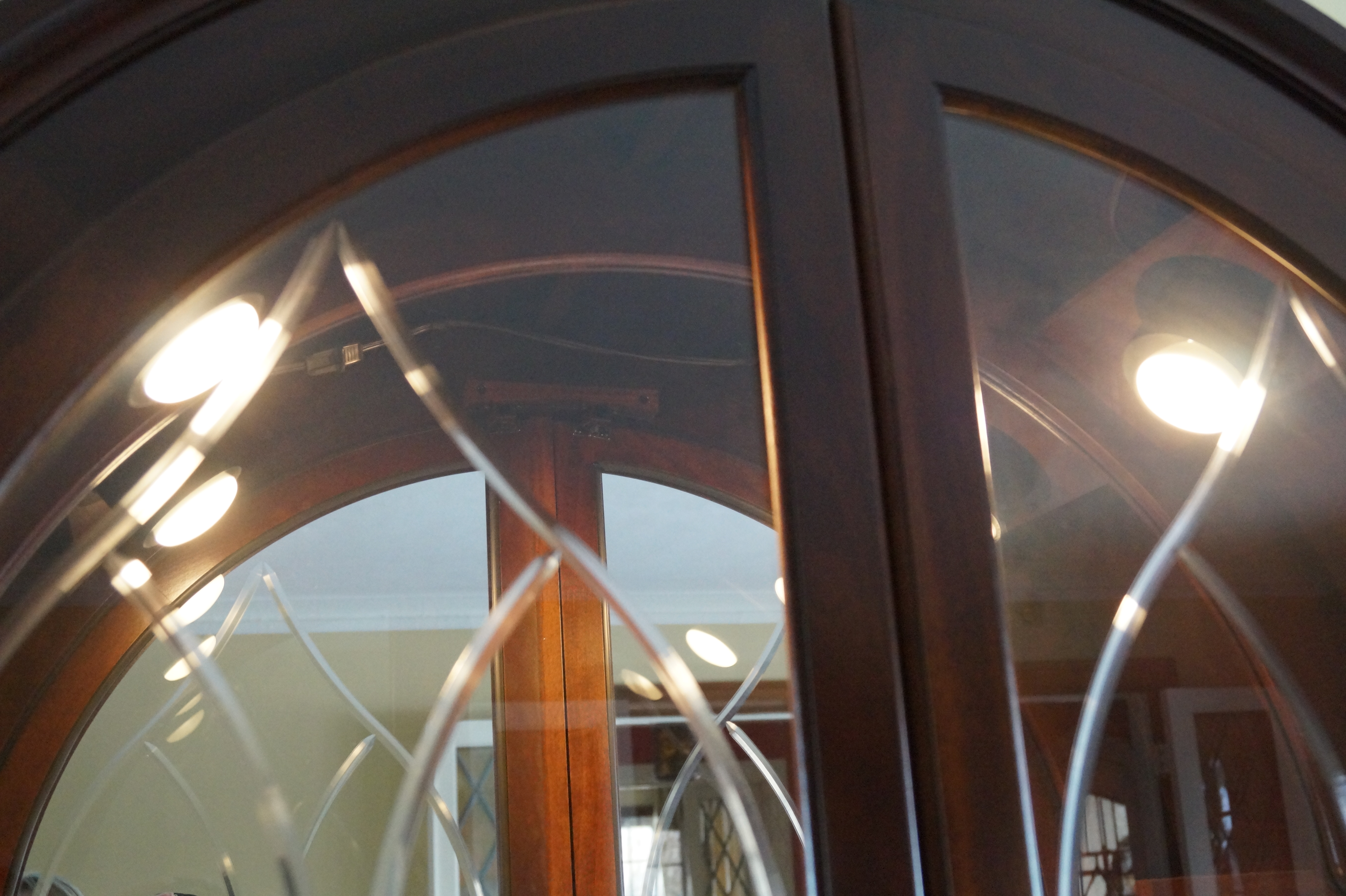 Philip Reinisch Cherry Finish Curio Cabinet with Beveled Glass