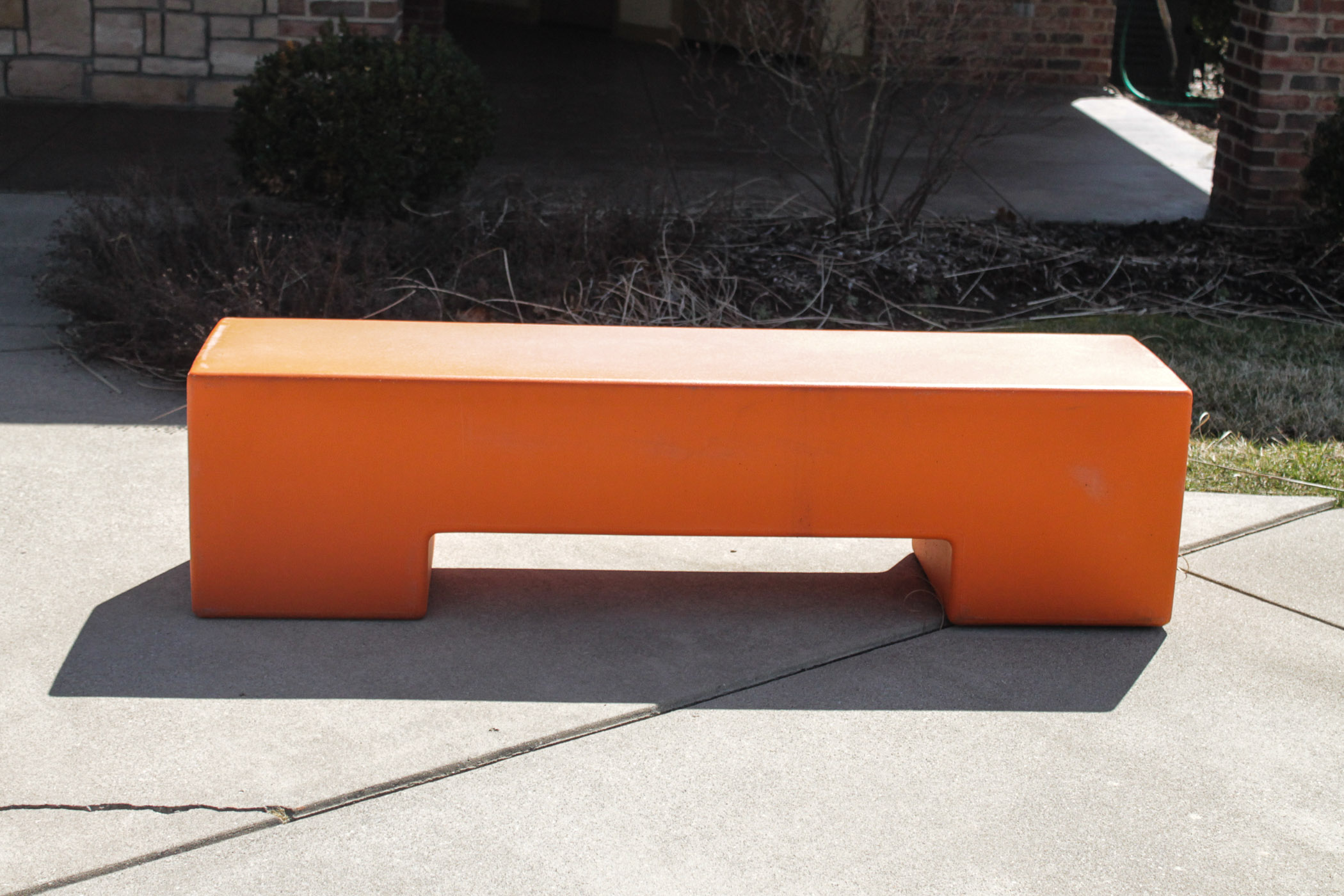 Orange Molded Plastic Bench
