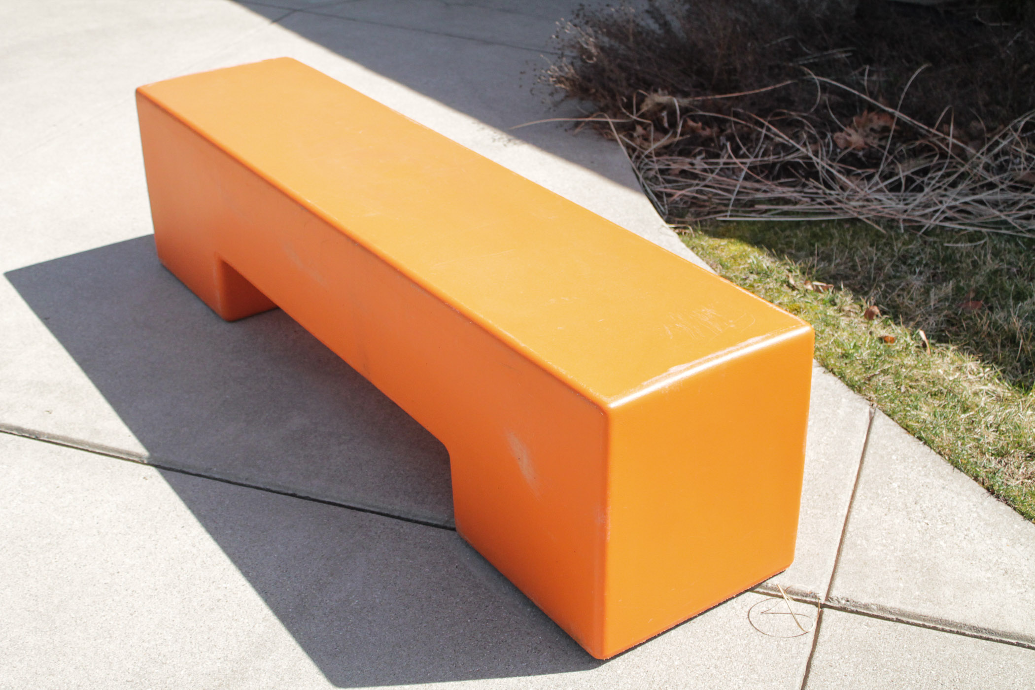 Orange Molded Plastic Bench
