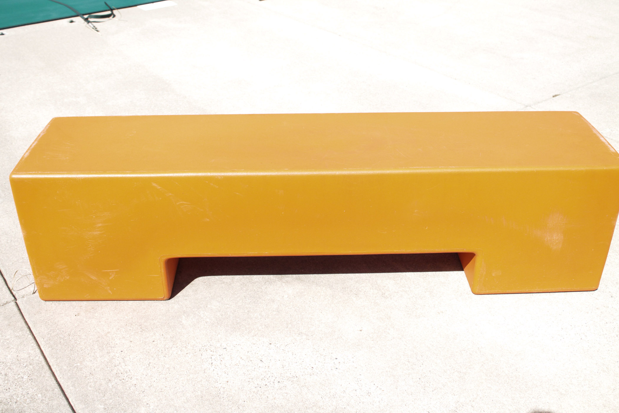Orange Molded Plastic Bench