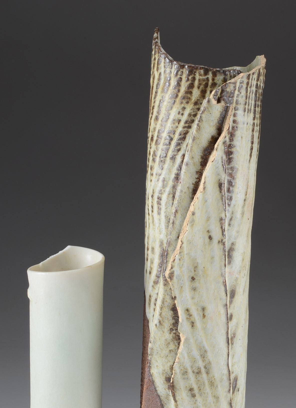 Two Cylindrical Pottery Vases