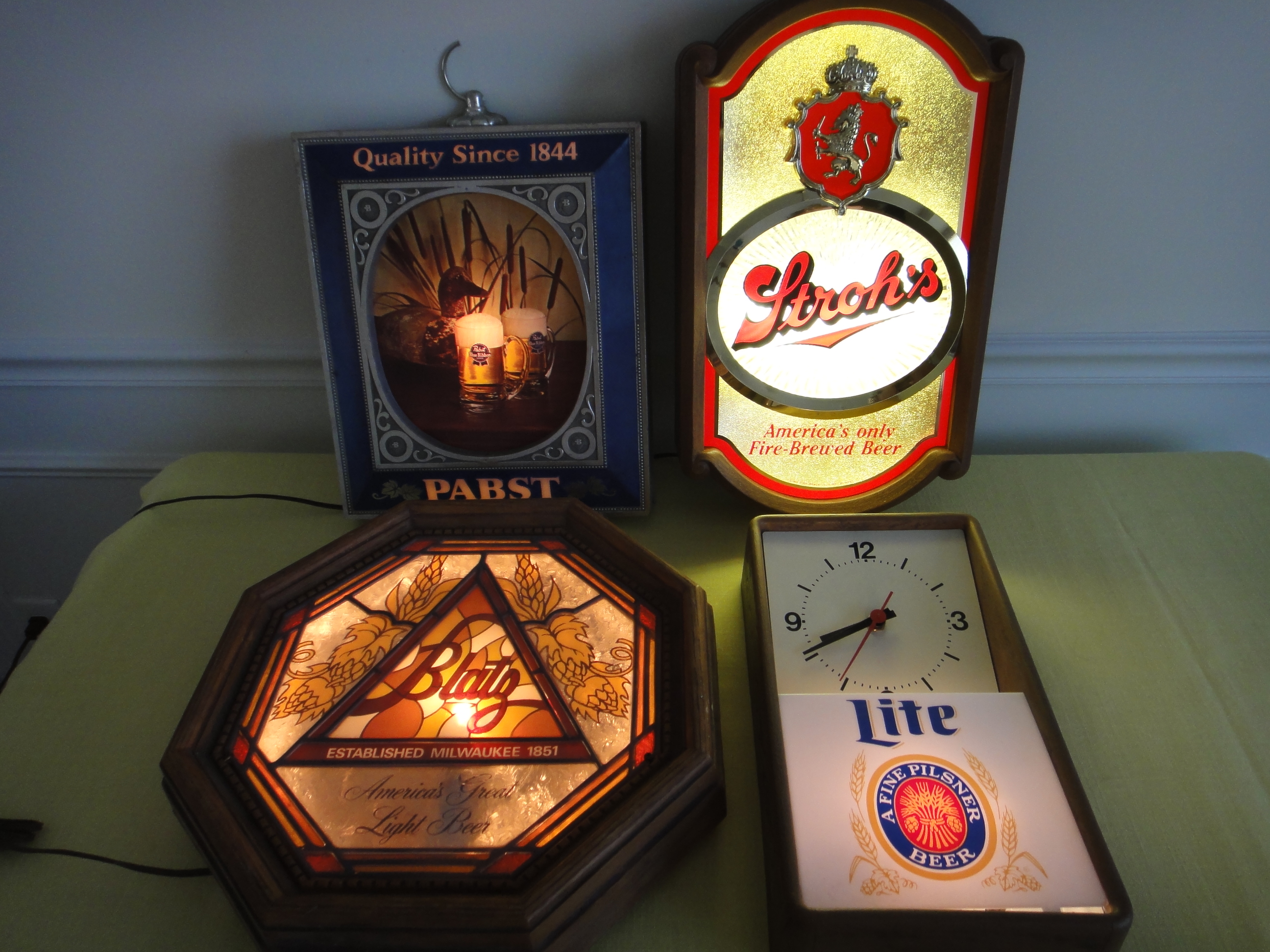Four Vintage Lighted Beer Signs