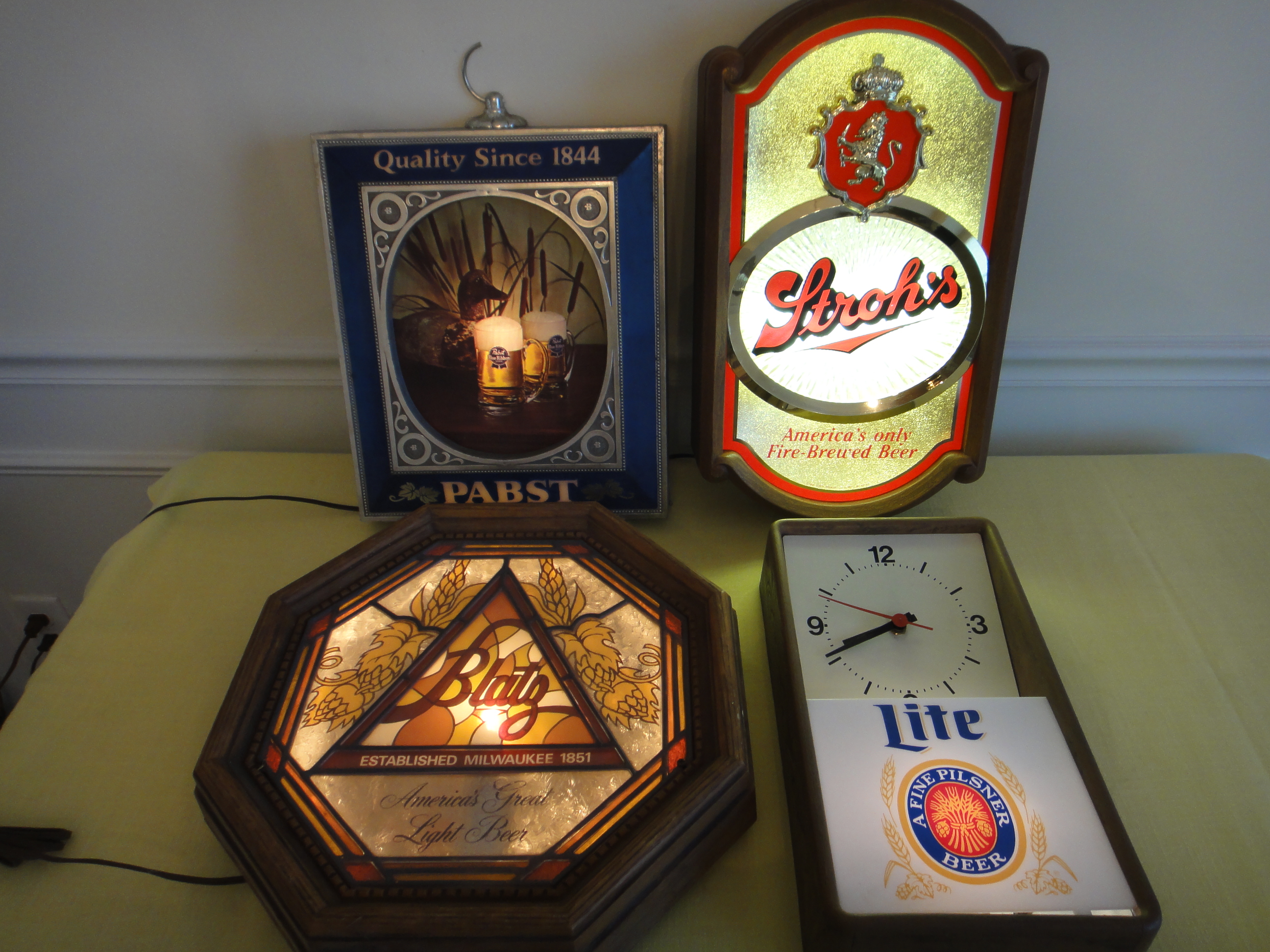 Four Vintage Lighted Beer Signs