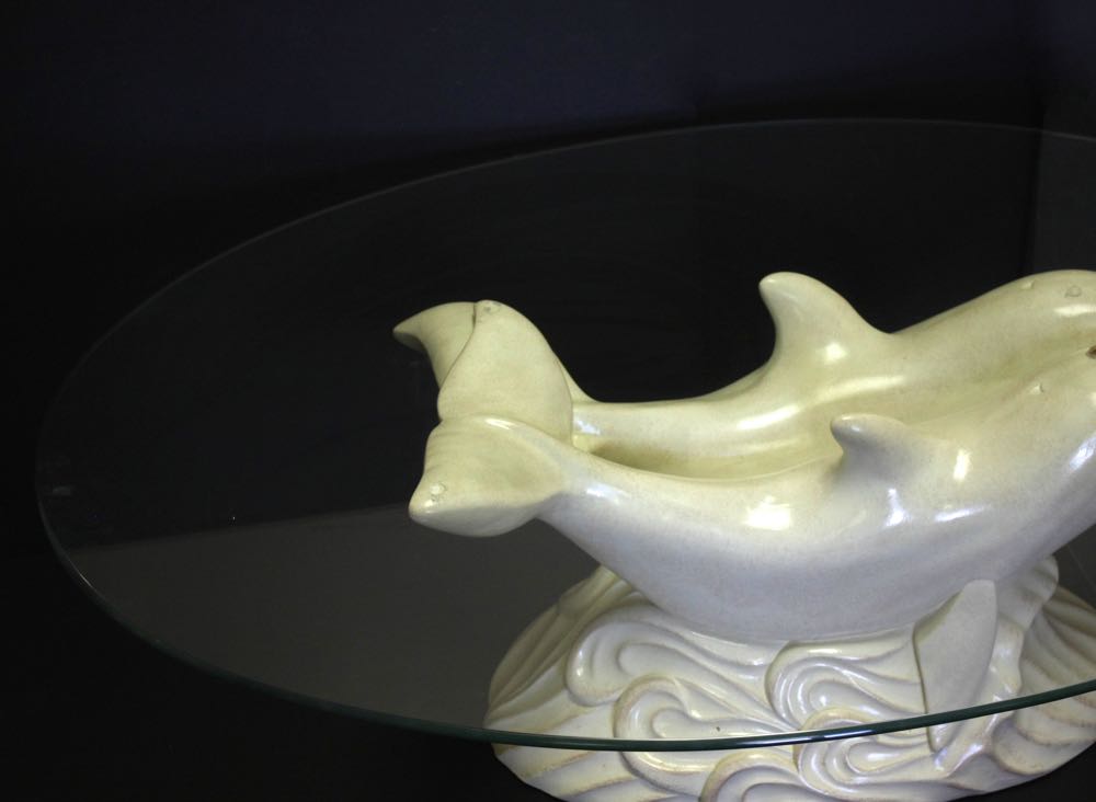 Glass Top Cocktail Table with Dolphin Base