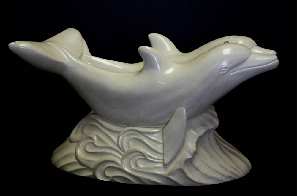 Glass Top Cocktail Table with Dolphin Base