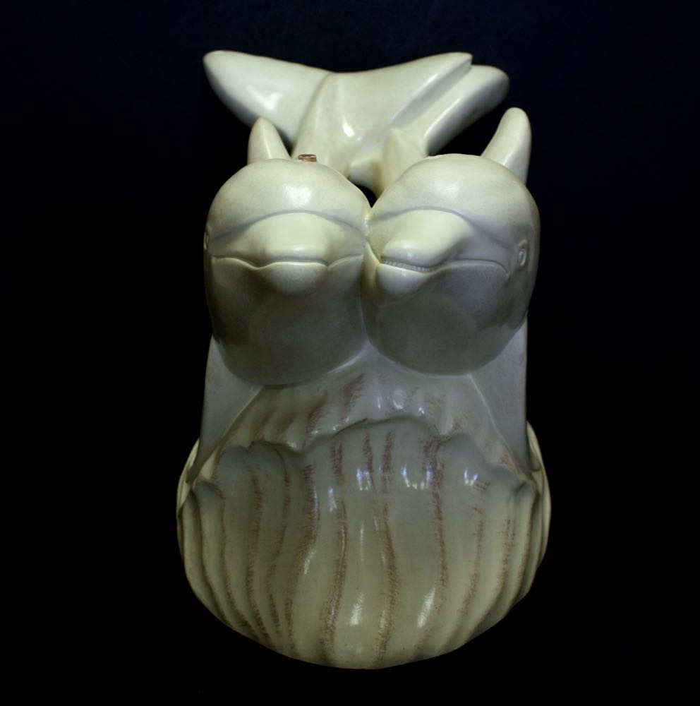 Glass Top Cocktail Table with Dolphin Base