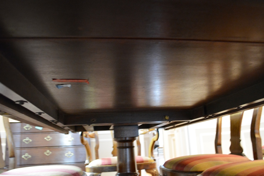 Arthur Brett & Sons, Ltd. Dining Table and Ten Chairs